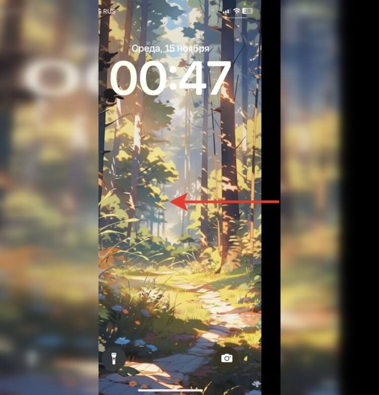 Как включить фонарик на Айфоне. Выключить фонарик можно, слегка сместив локскрин влево. Фото.